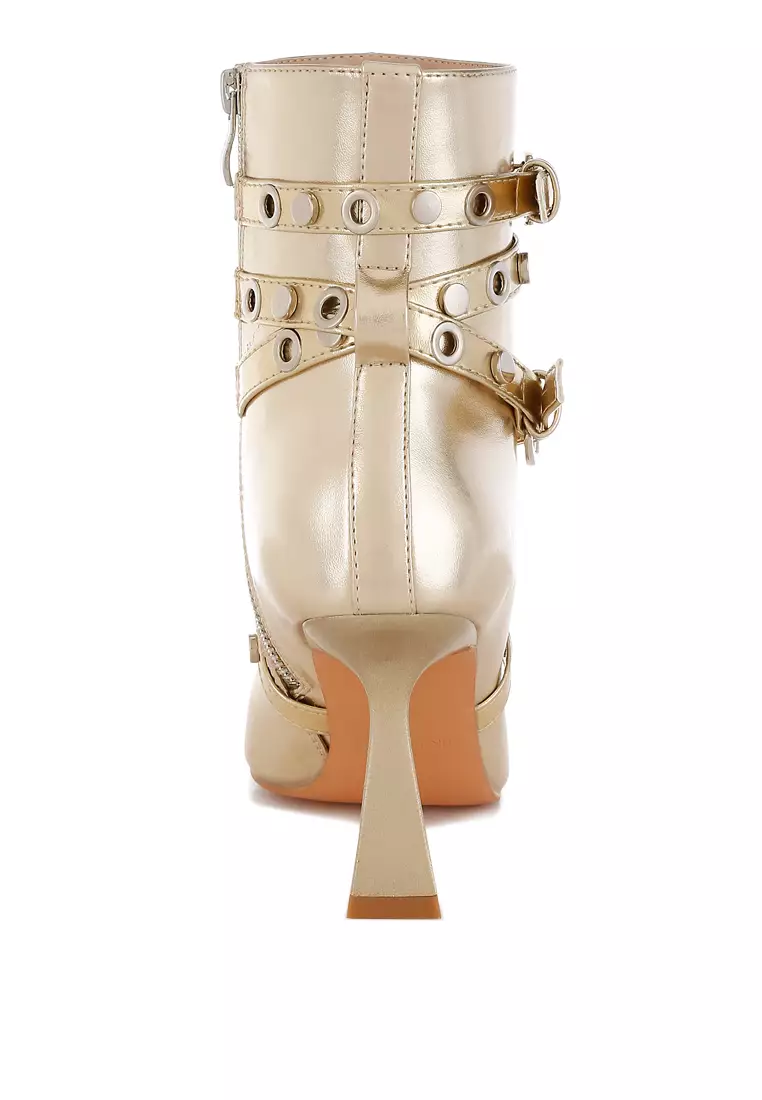 Eyelets & Studs Harness Ankle Boots in Gold