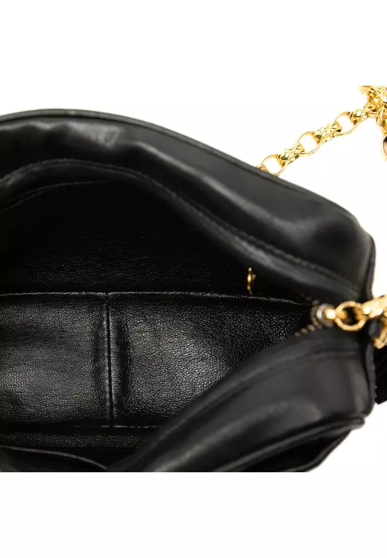 Pre-Loved Chanel Cc Vertical Quilted Lambskin Tassel Camera Bag