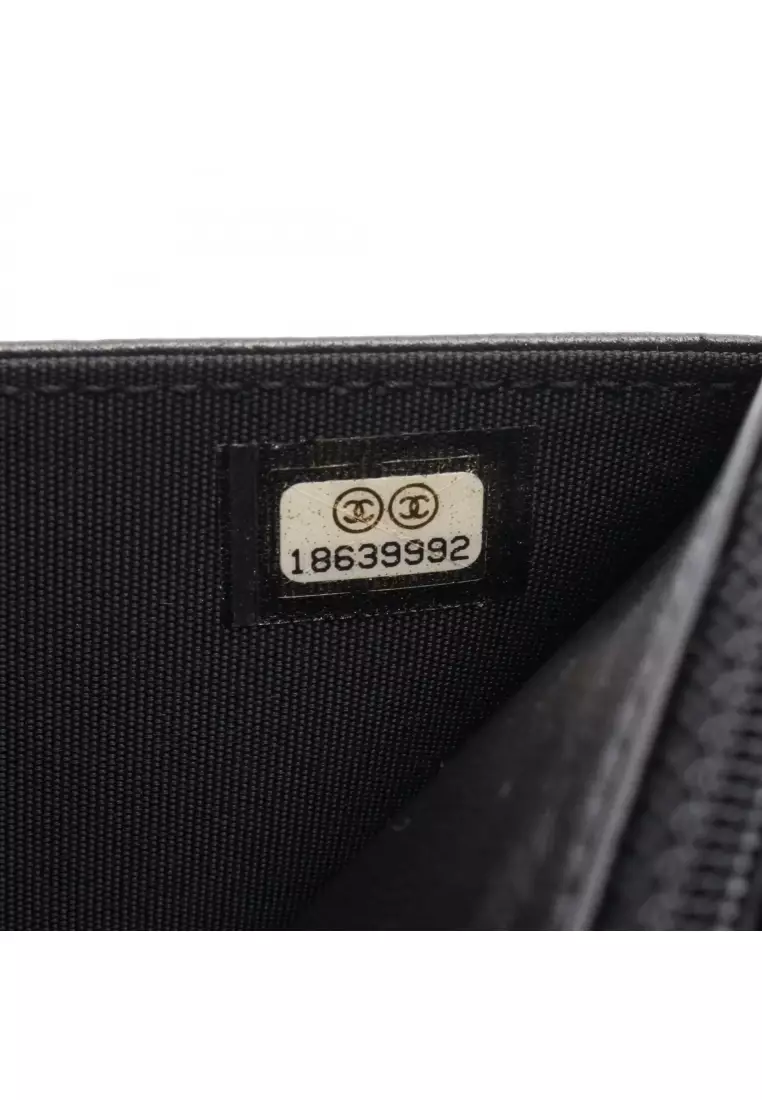 Pre-Loved Chanel coco mark chain wallet leather black silver hardware