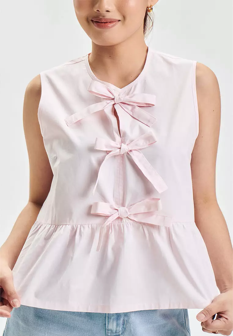 Sleeveless Peplum Top with Bows