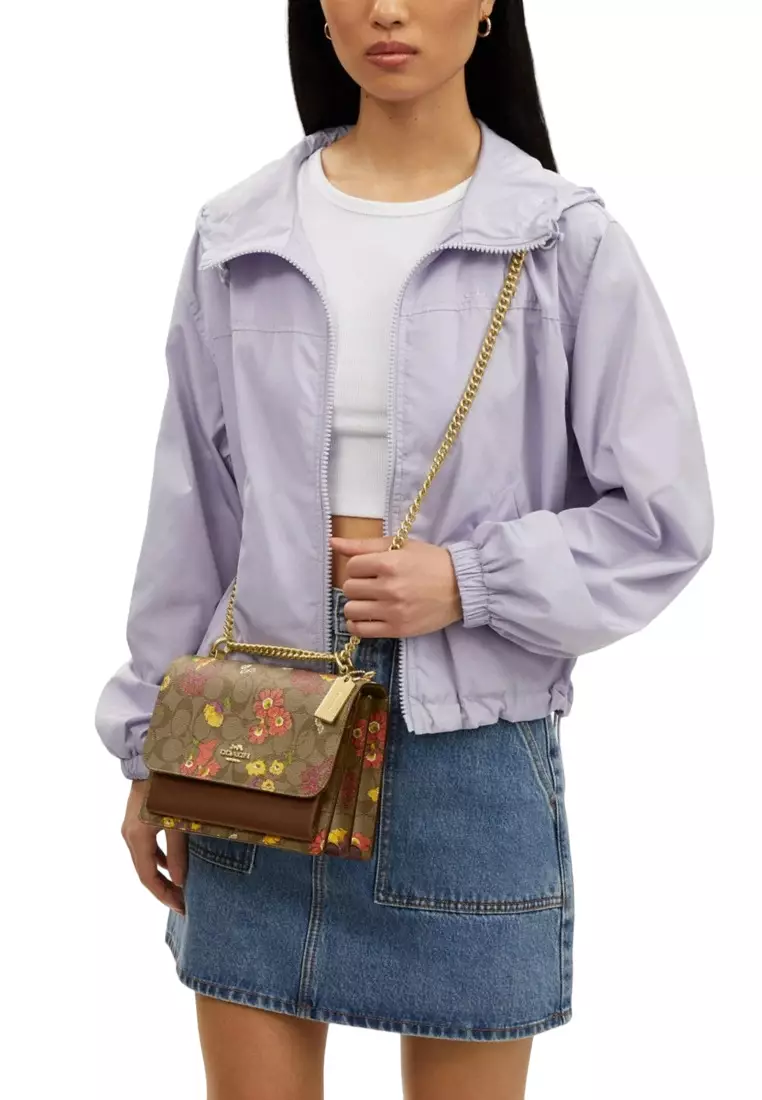 Klare Crossbody Bag In Signature Canvas With Floral Print - Brown/Multi