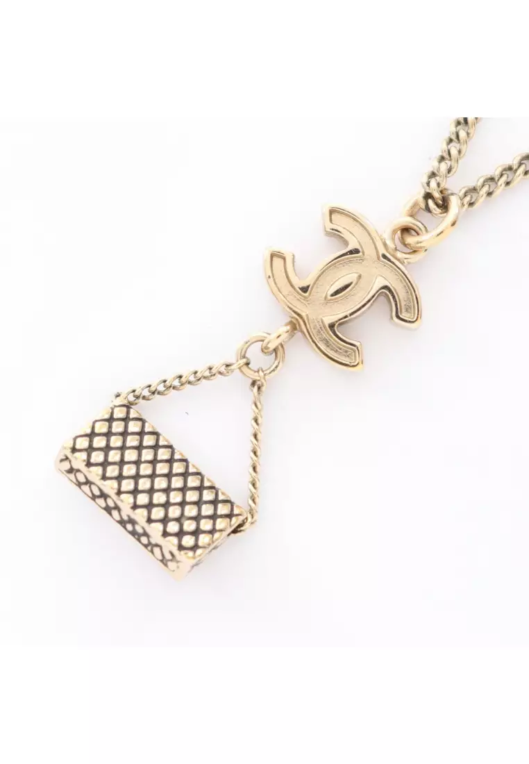 Pre-Loved Chanel coco mark matelasse necklace GP gold black 09P