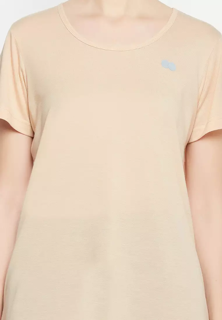 Clovia Comfort Fit Longline Active T-shirt in Cream Colour