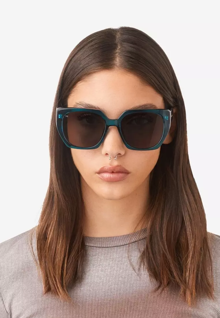 HAWKERS Blue Dark Eco Boujee Sunglasses For Women, Female. Official Product Designed In Spain
