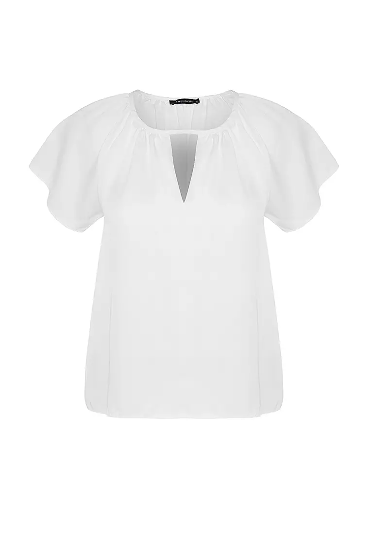 white flared sleeve blouse