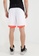Under Armour white Baseline 10 Inch Shorts 1BA0CAAEFE4BFAGS_1