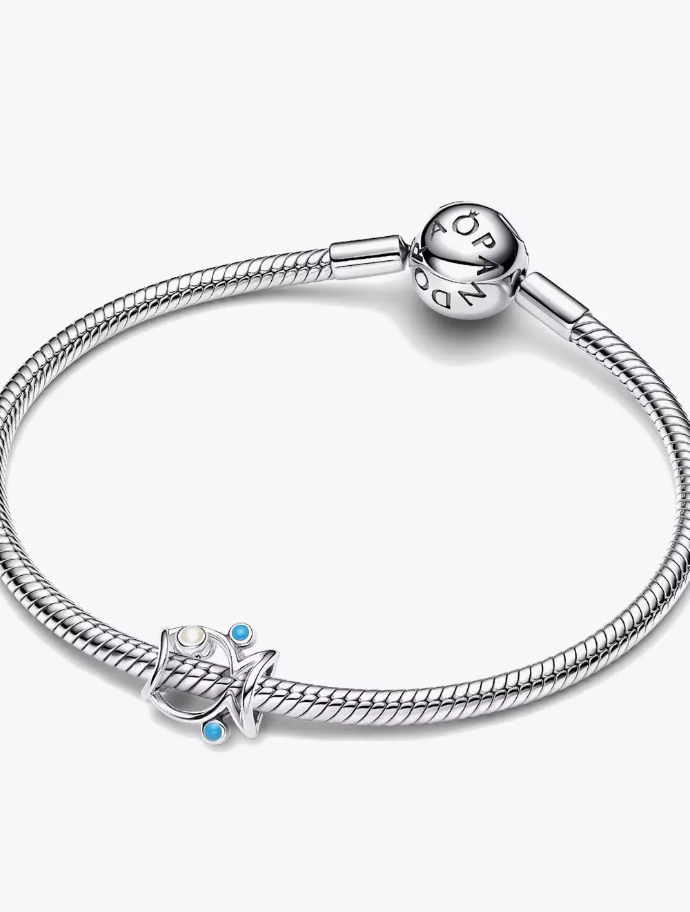 Fish sterling silver charm with shimmering white and turquoise enamel