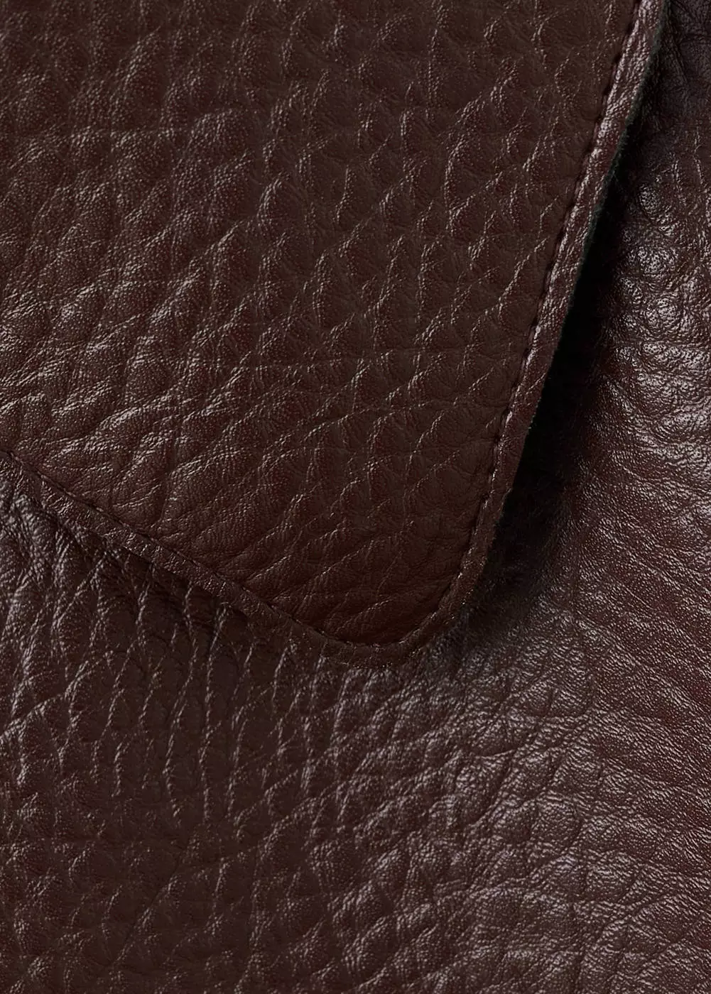 Jaket kulit sintetis dengan saku