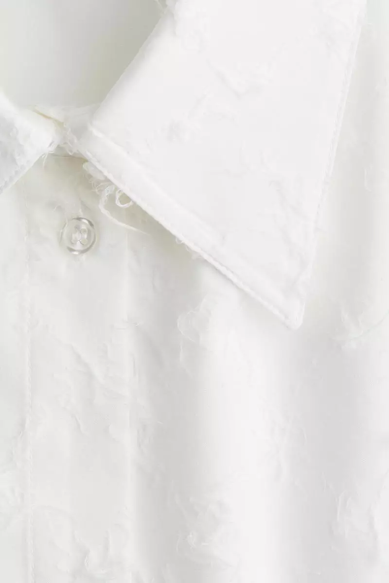 Oversized fringed shirt