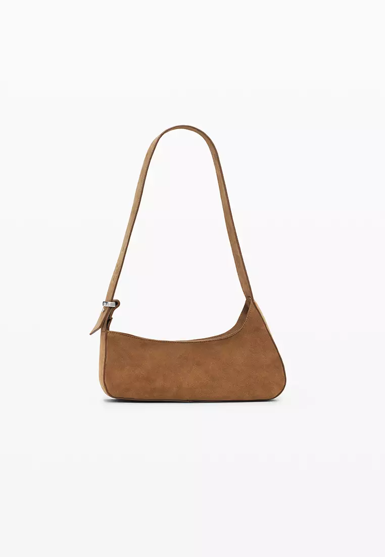 100% leather bag with small asymmetrical flap