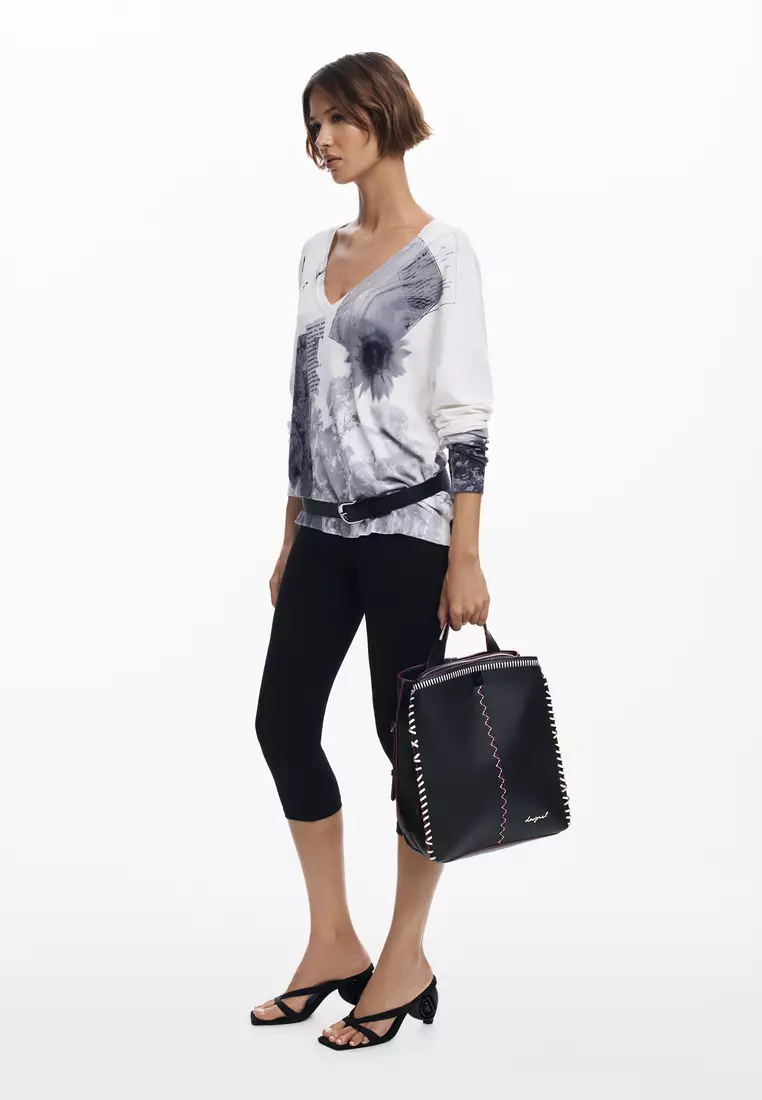 Large faux leather effect backpack with topstitching