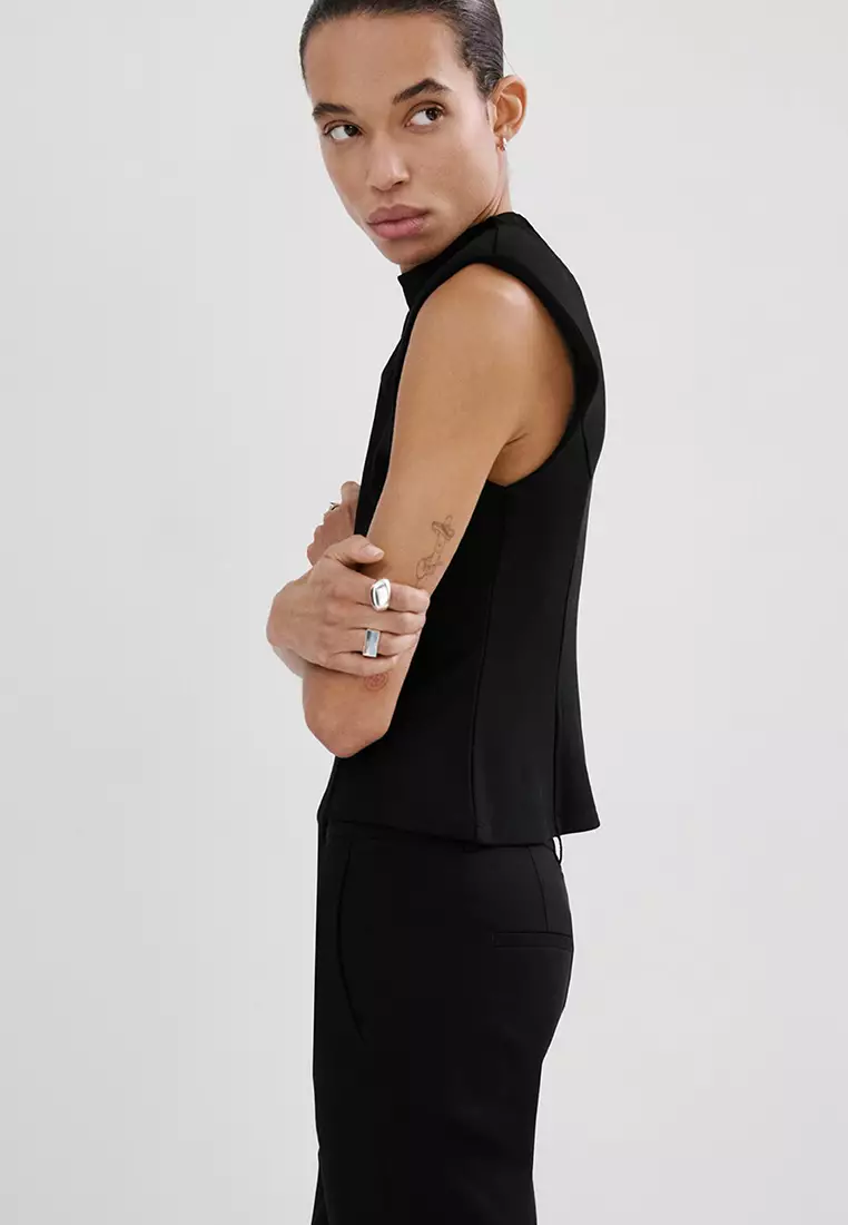 荷葉邊墊肩上衣