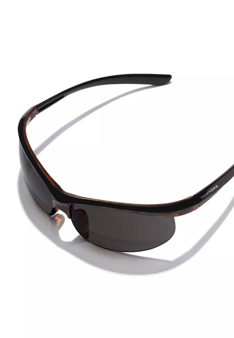 HAWKERS Vintage Carey Dark Grey Radiante Sunglasses For Men And Women, Unisex. Official Product Designed In Spain