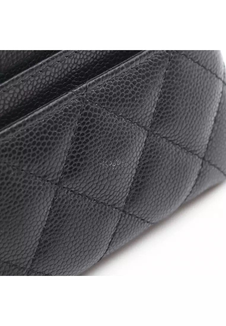 Pre-Loved Chanel matelasse card case coin purse Caviar skin black gold hardware