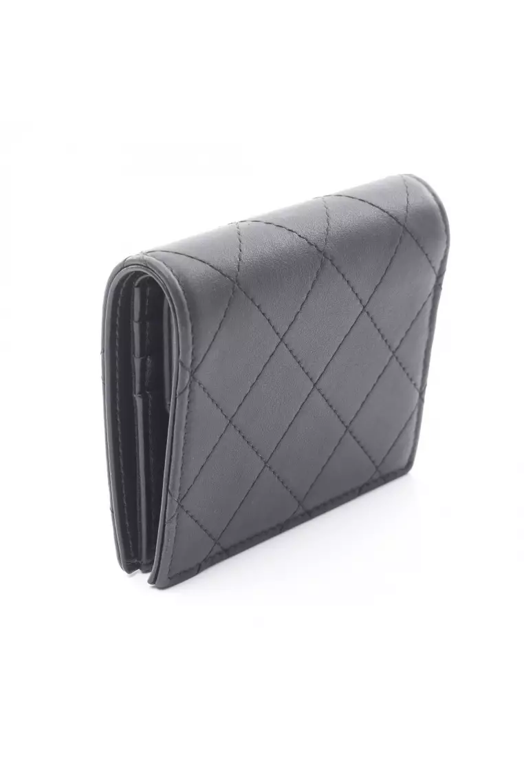 Pre-Loved Chanel matelasse Bi-fold wallet leather black silver hardware