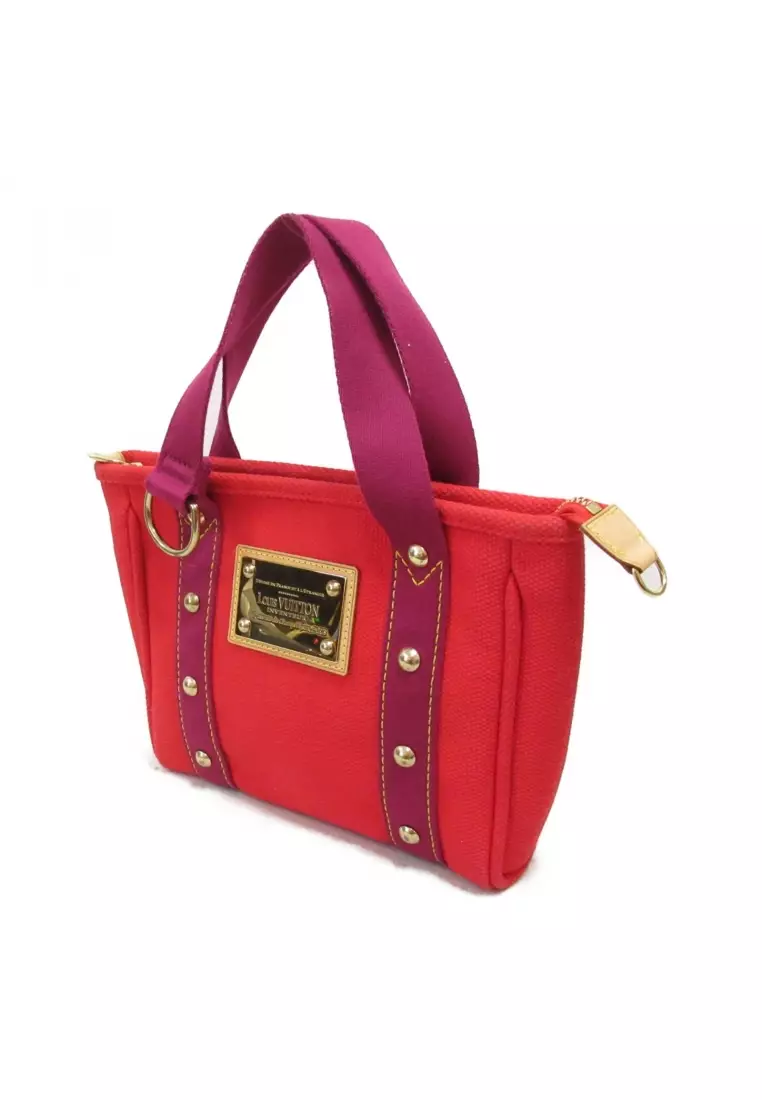 Louis vuitton red tote hotsell