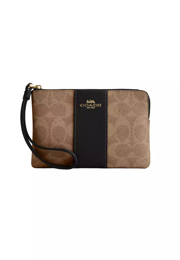 Buy Coach Corner Zip Wristlet In Signature Canvas With Stripe Tan