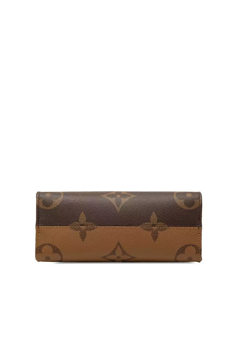 Pre-Loved Louis Vuitton Monogram Reverse Giant Onthego Pm