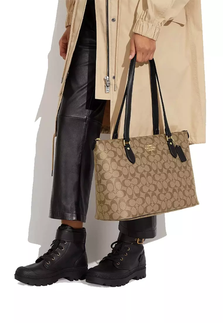 Coach zip top sales tote in signature canvas
