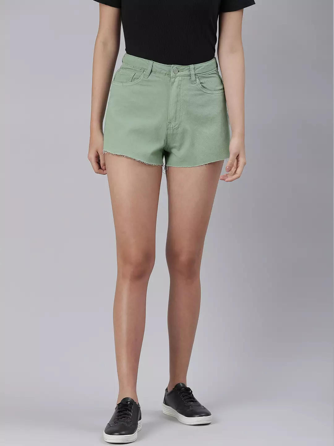 green denim shorts