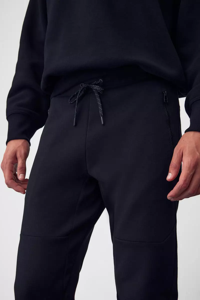 Buy H&M DryMove™ Tapered tech joggers with zipped pockets 2024