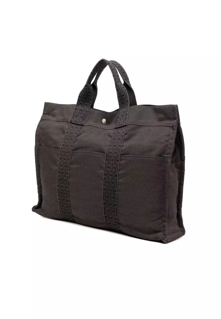 Pre-Loved Hermès Canvas Herline Mm