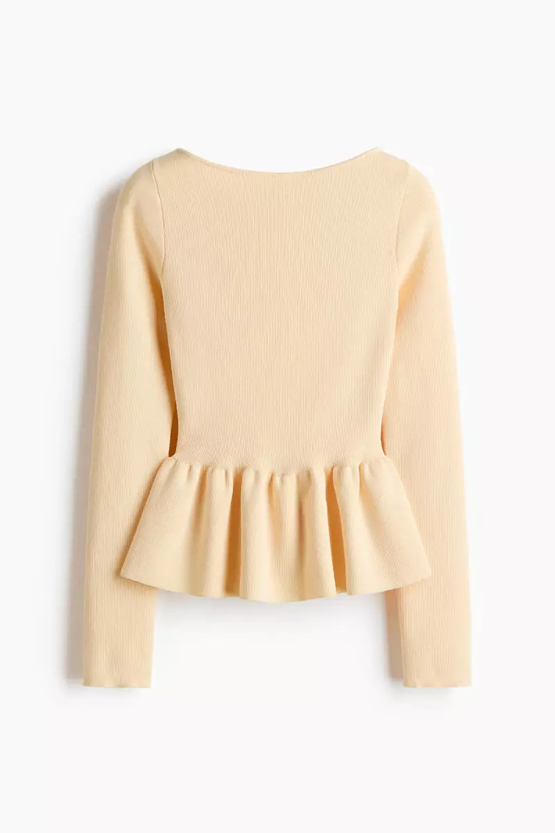 Knitted peplum top