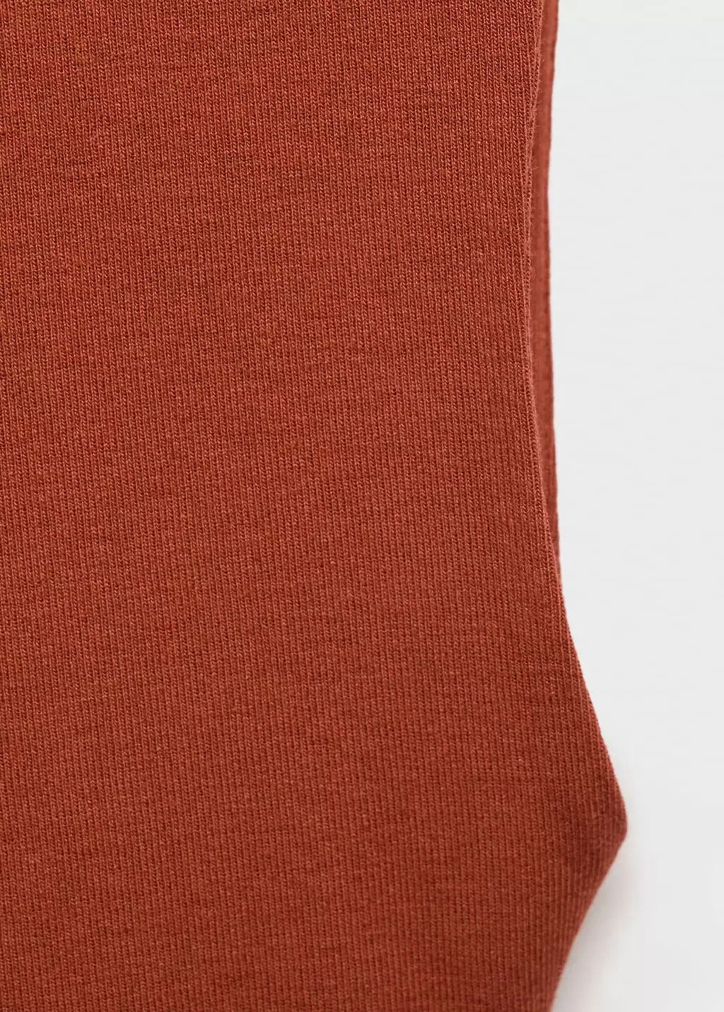 Atasan ketat berkerut