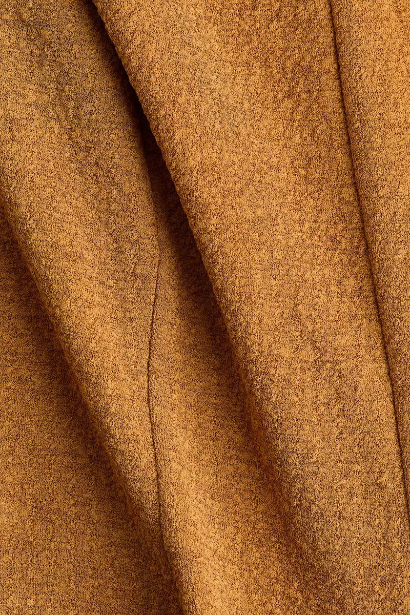 Sleeveless peplum top