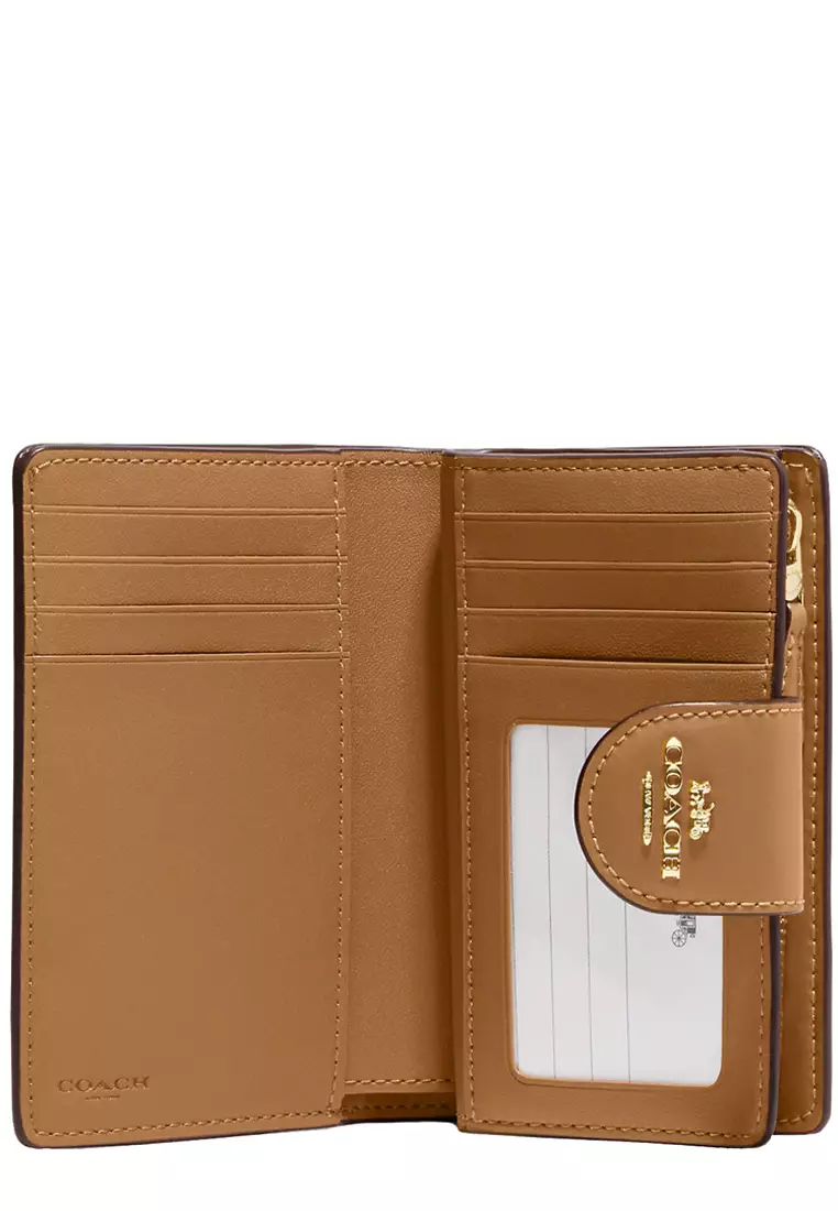 Buy Coach Coach Medium Corner Zip Wallet in Signature Canvas in Light ...