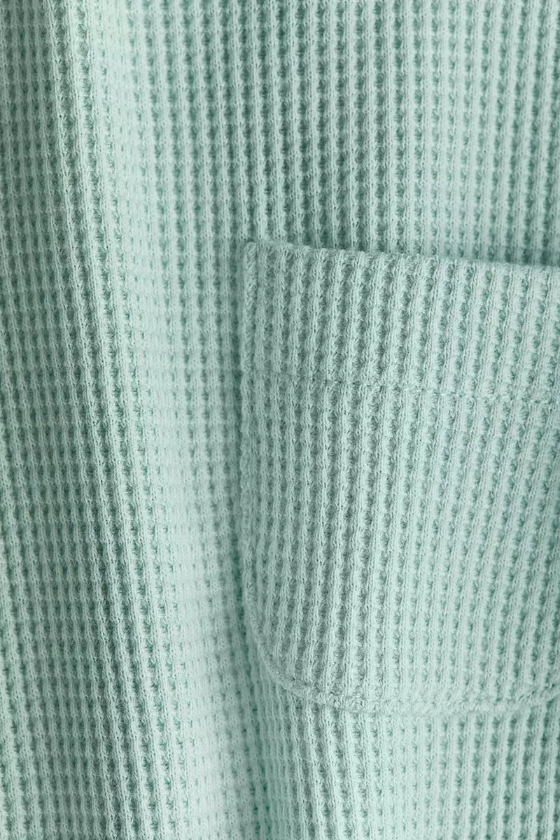 Waffled cotton romper suit