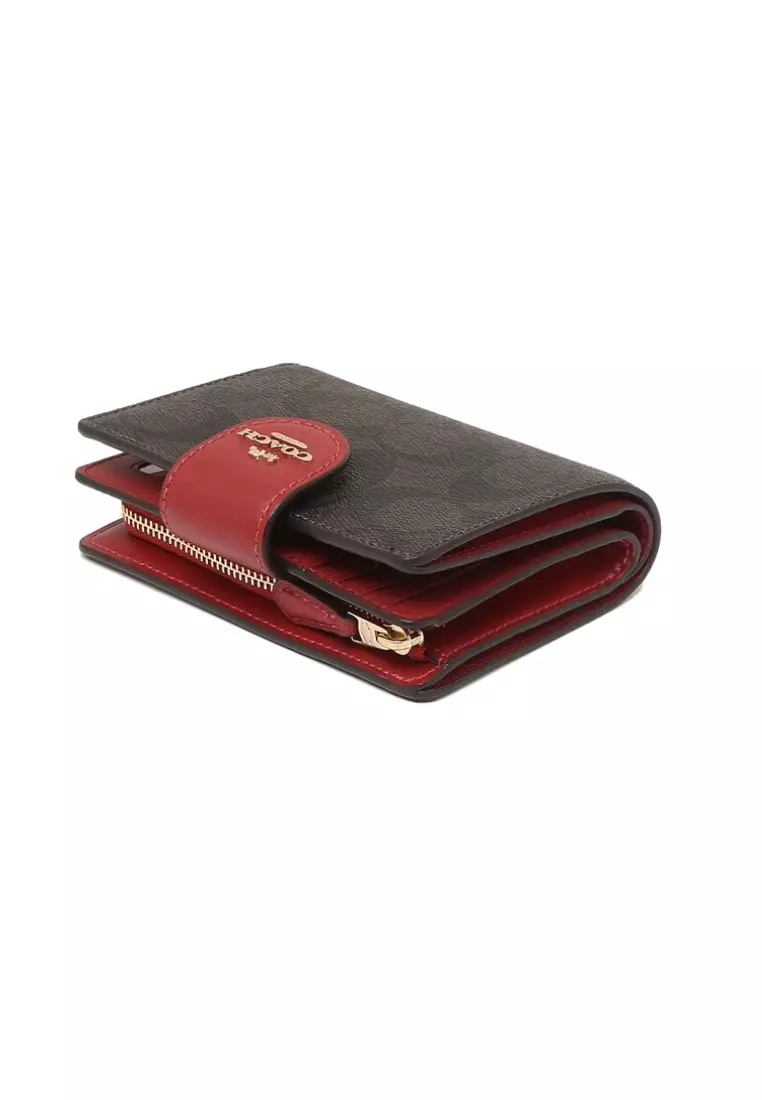 Buy COACH Coach Medium Corner Zip Wallet In Signature Canvas