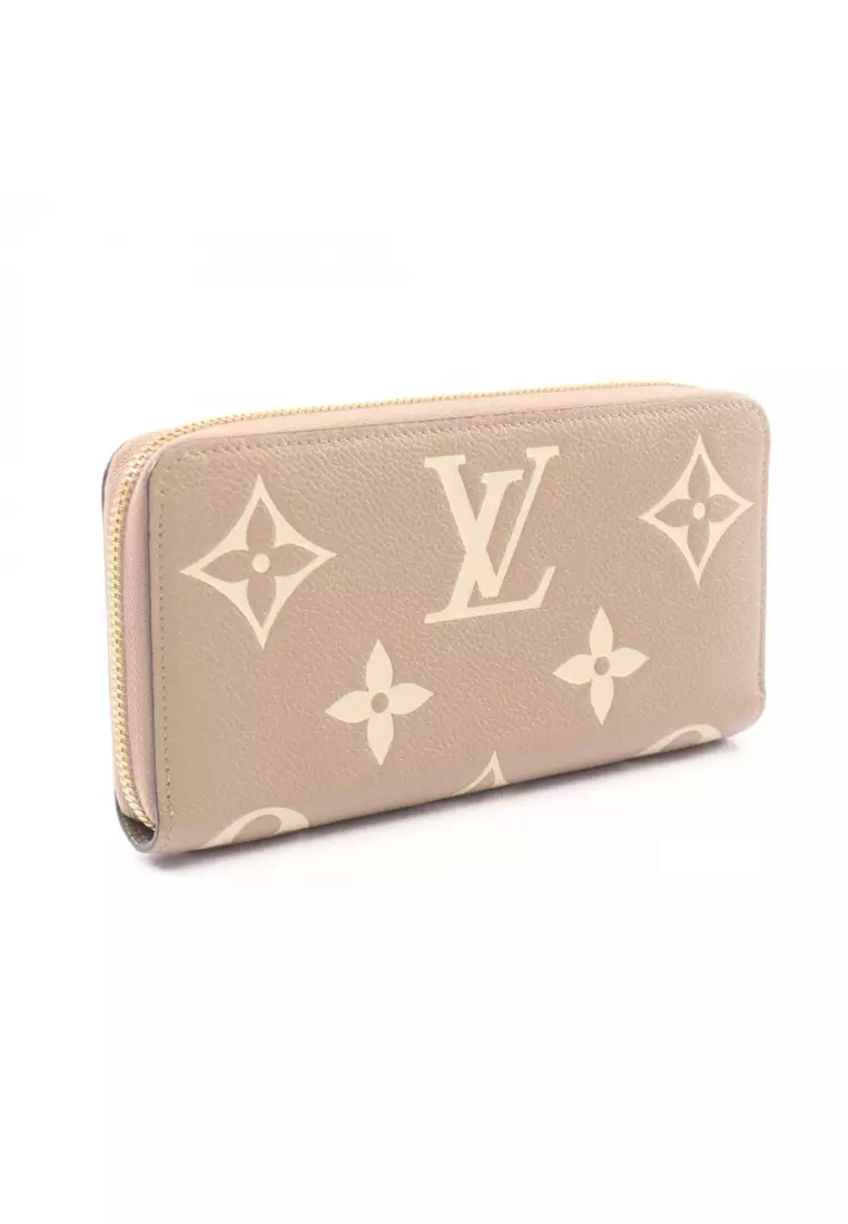 Pre-Loved Louis Vuitton zippy wallet bicolor monogram Empreinte tourterelle claim round zipper long wallet leather Gray beige ivory