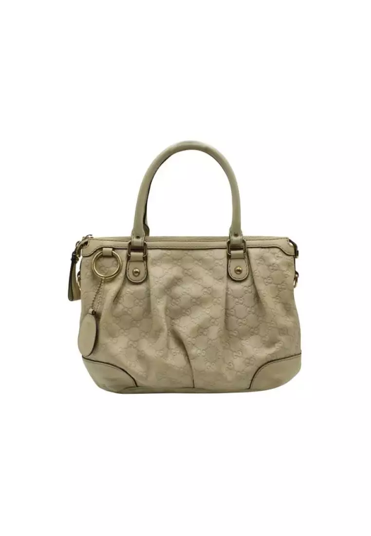 Ivory hot sale gucci bag