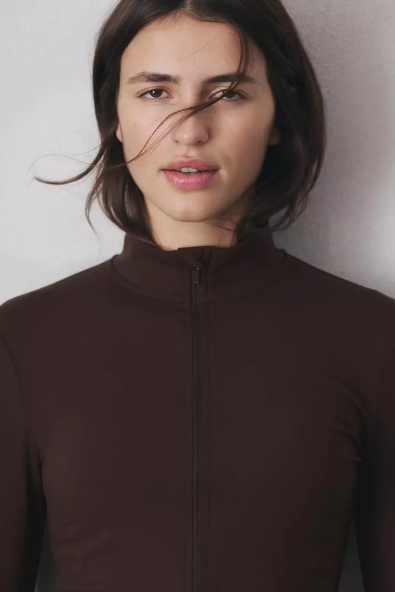 Zip-through sports jacket with SoftMove™