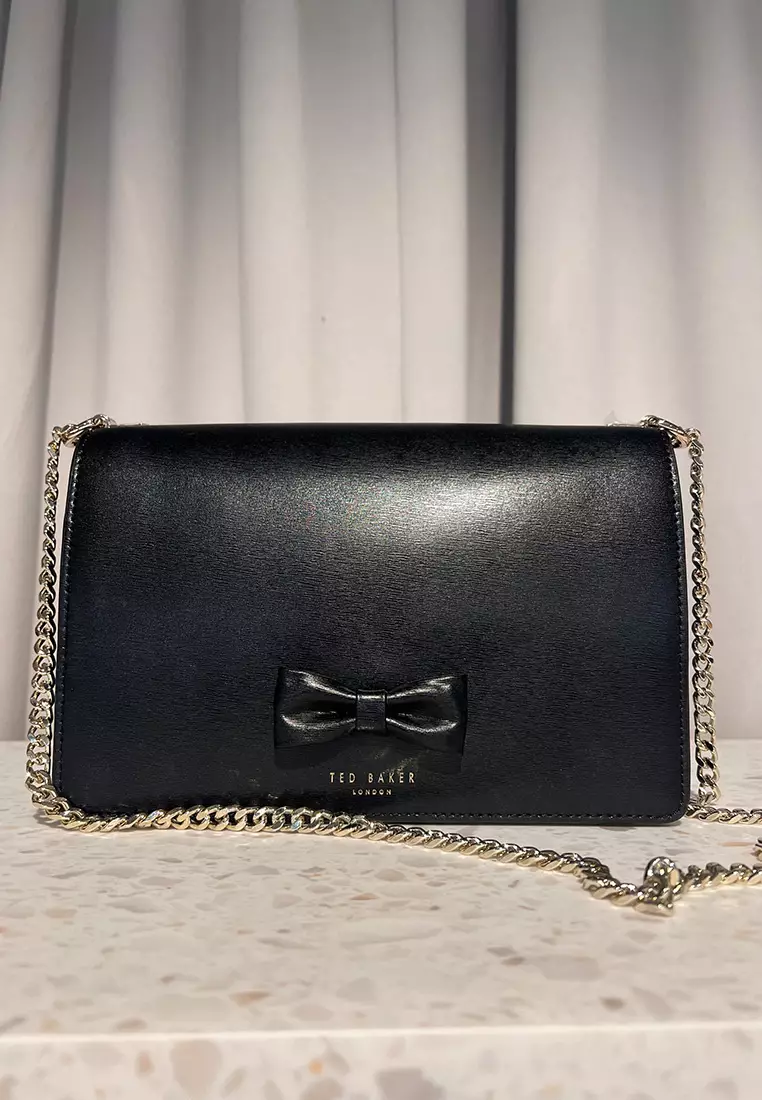 Bow detail leather cross body bag hotsell