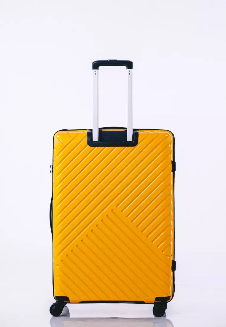 Yellow luggage 2025