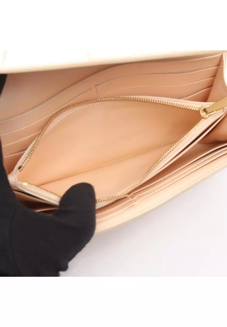 Pre-Loved BOTTEGA VENETA Intrecciato flap wallet long wallet Bi-fold Long Wallet leather Light pink