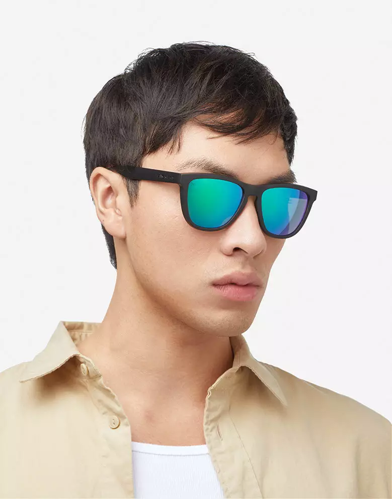 HAWKERS POLARIZED Black Emerald ONE RAW. Sunglasses for Men and Women, Unisex. UV400 protection. Official product designed and made in Spain. HONR21BFTP