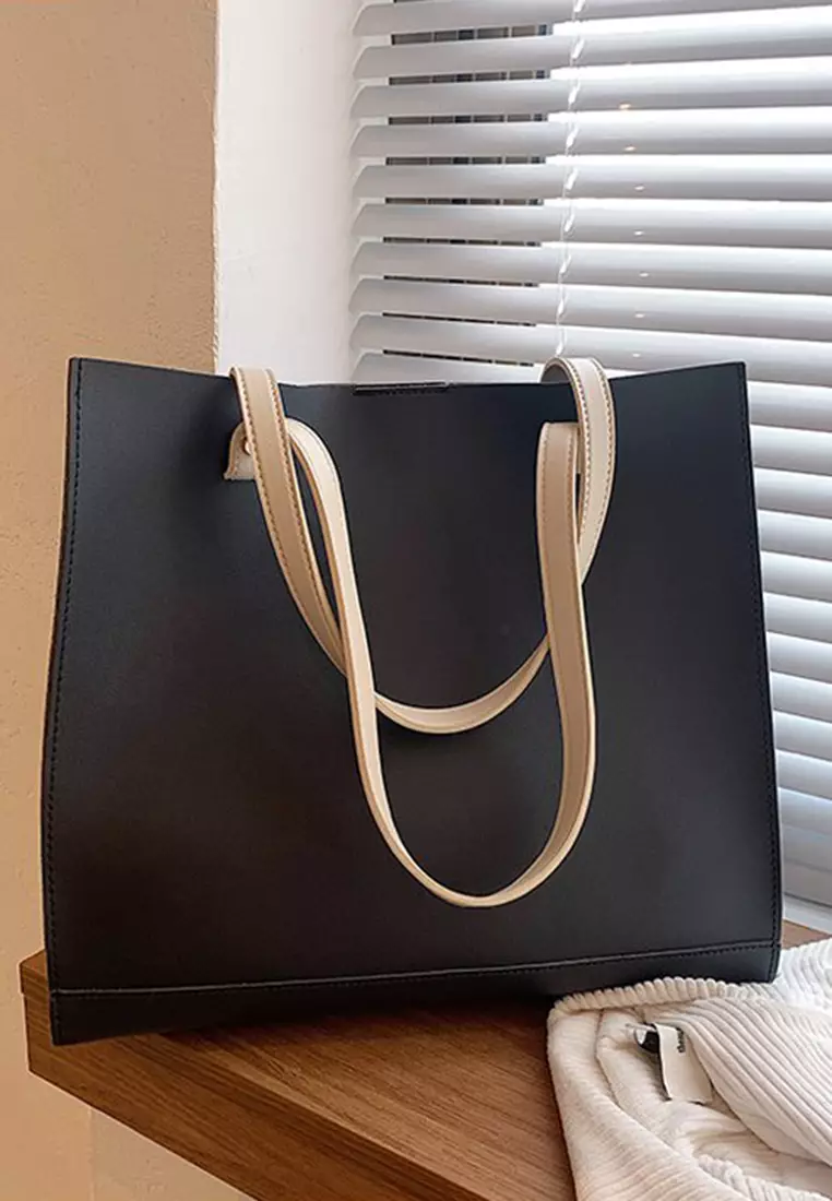 black leather tote bag with zipper