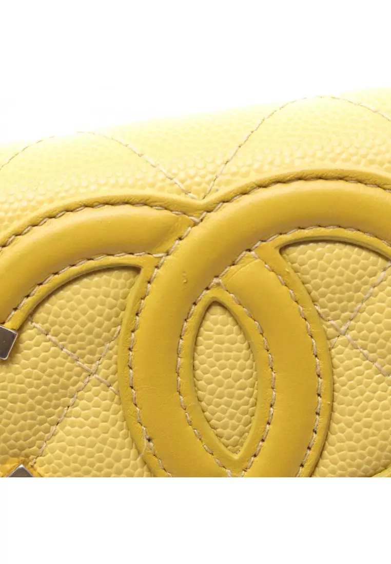 Pre-Loved Chanel CC filigree Bi-fold Long Wallet Caviar skin leather yellow gold hardware