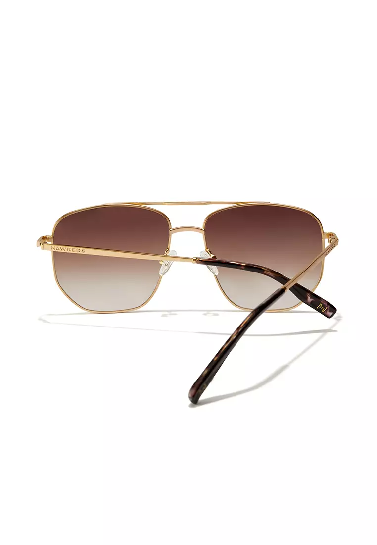 HAWKERS Gold Earth CAD Sunglasses for Men and Women, Unisex. UV400 Protection. Official Product designed in Spain