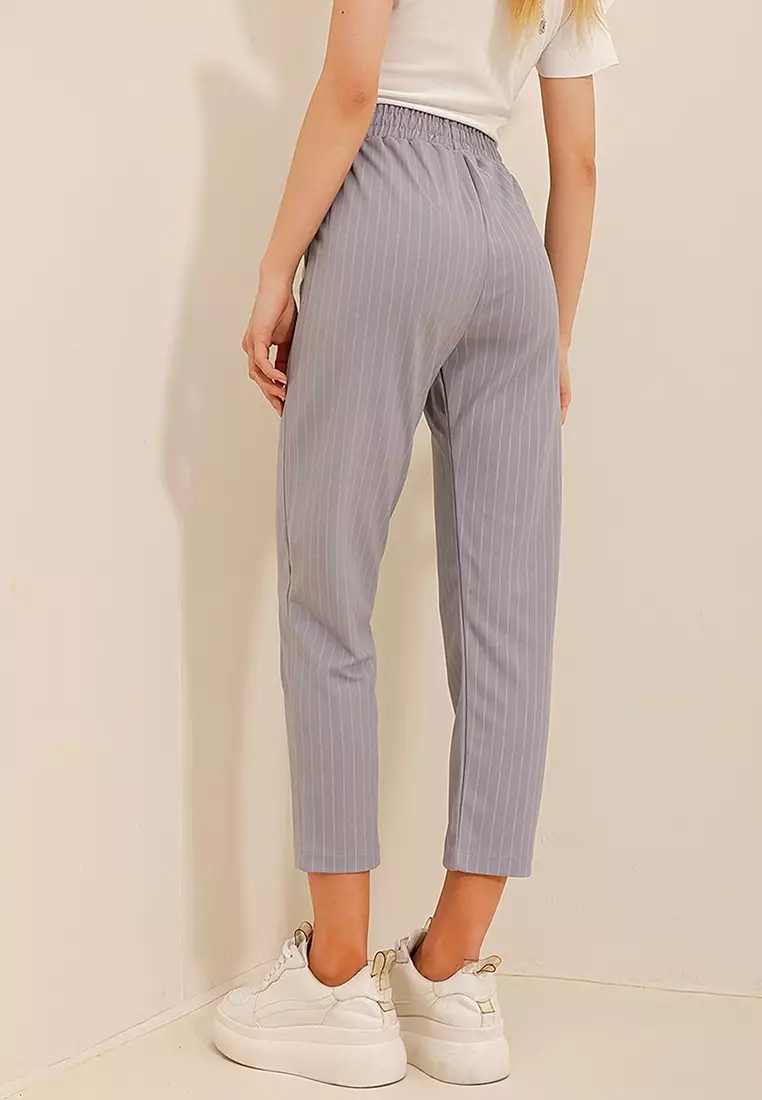 White deals striped trousers