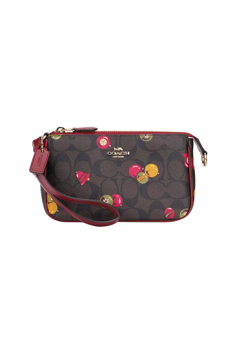 COACH Nolita Wristlet 19 With Cross Stitch Floral Print