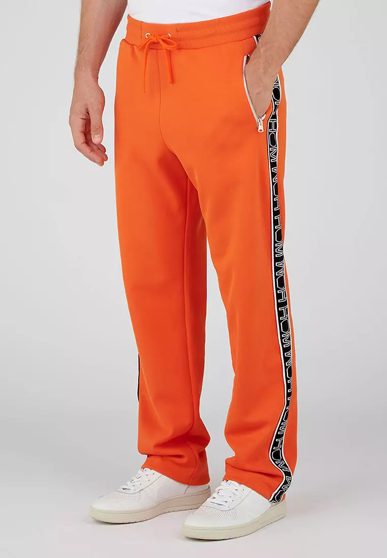 Orange shop track pants