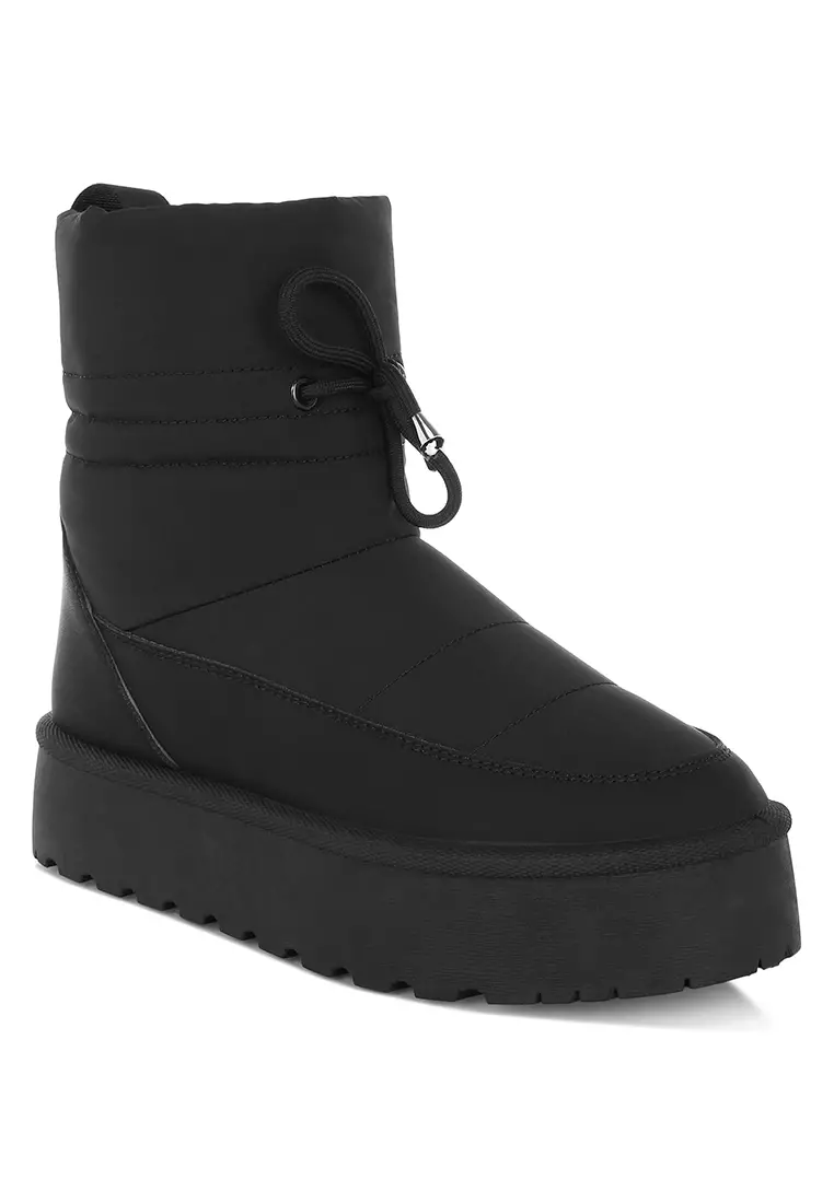 Sepatu bot salju tebal dengan pergelangan kaki tinggi berwarna hitam