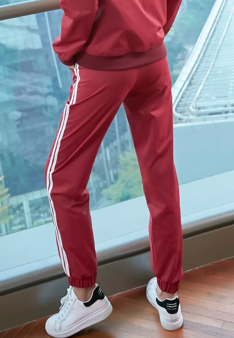 Red adidas track pants on sale women