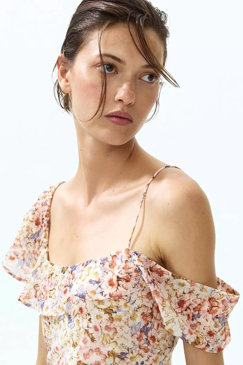 Asymmetric cold shoulder dress