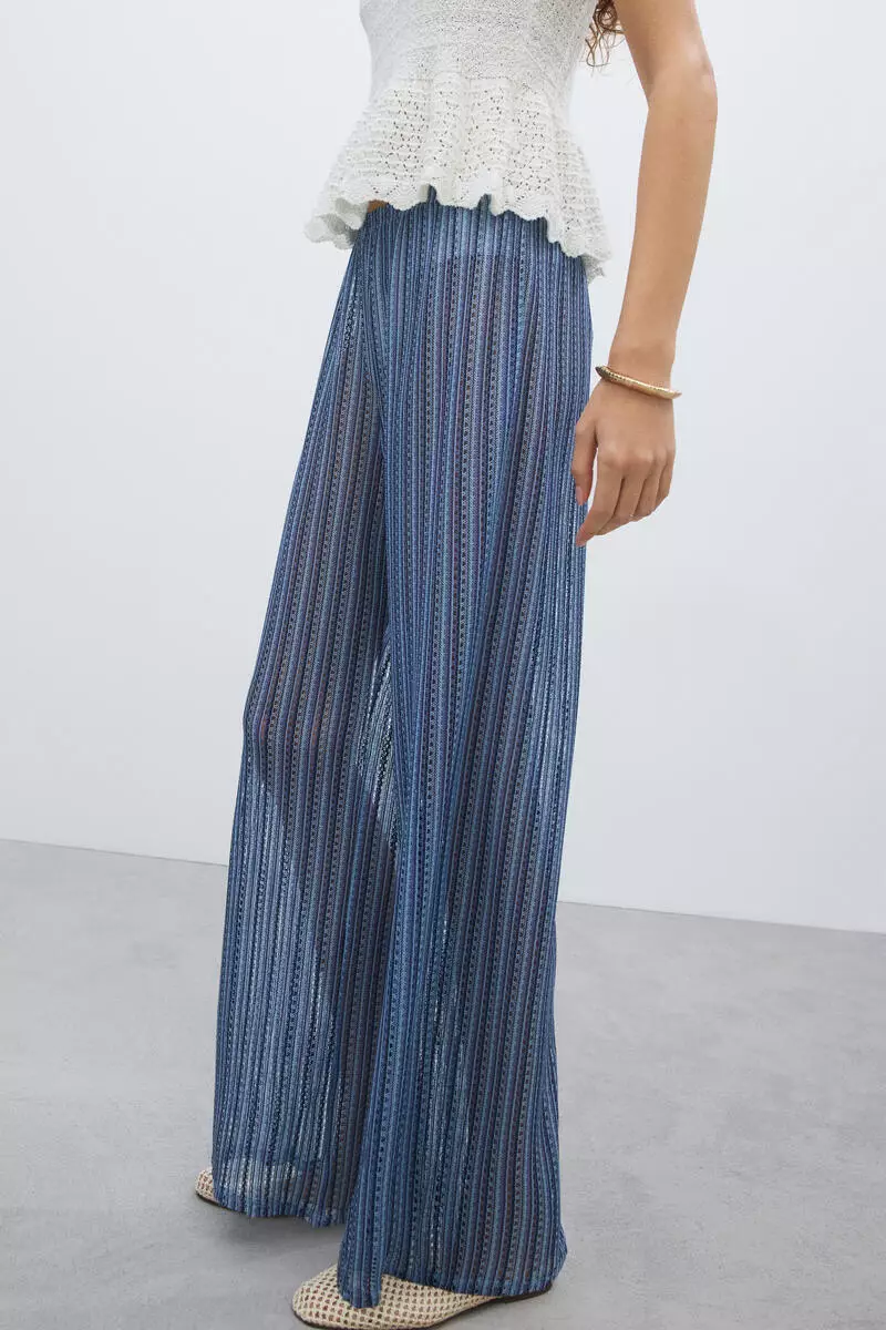 Wide hole-knit trousers