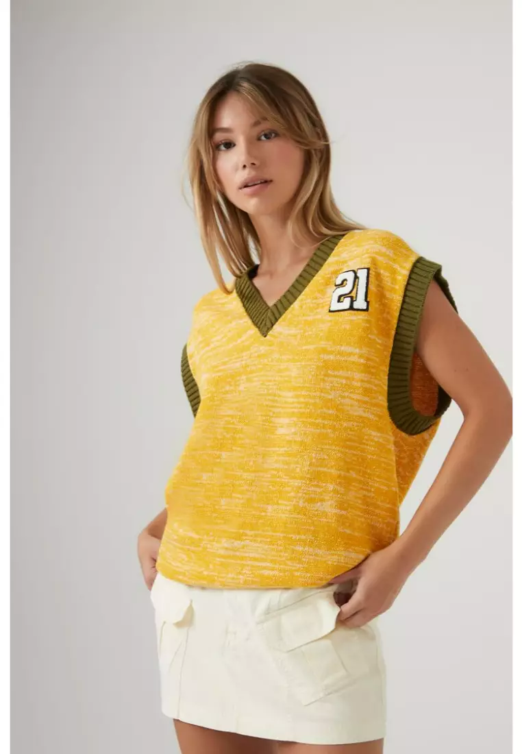 Yellow sweater vest online